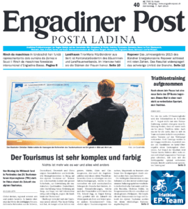 Zeitungsartikel über einen Konferenz mit einem Foto einer Graphic Recorder vor seiner Arbeit
